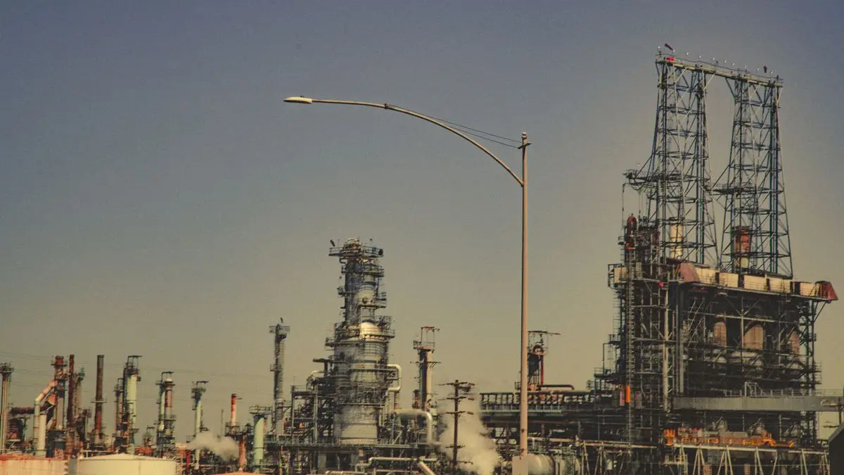 Oil refinery with pipes and towers